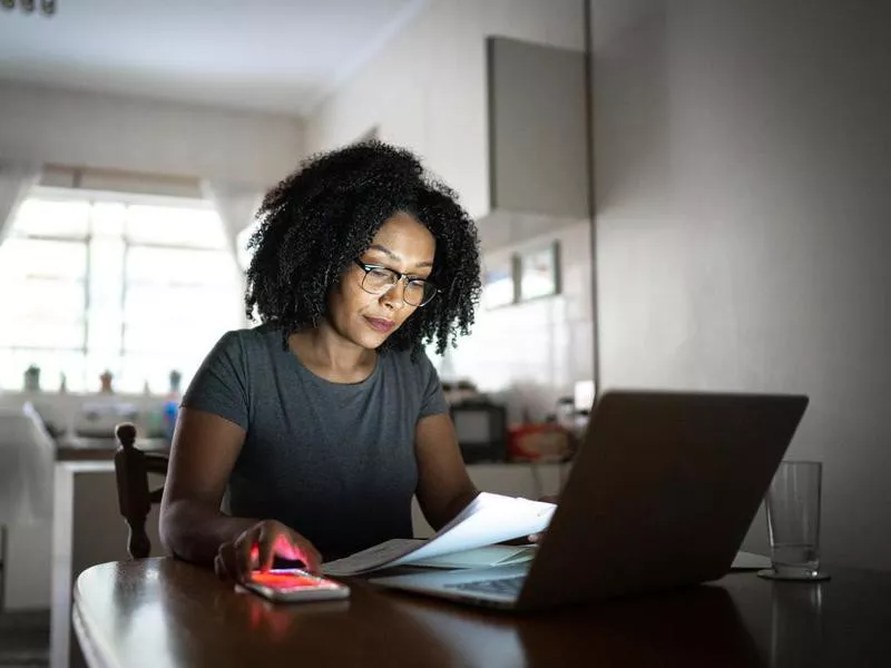 woman paying bills